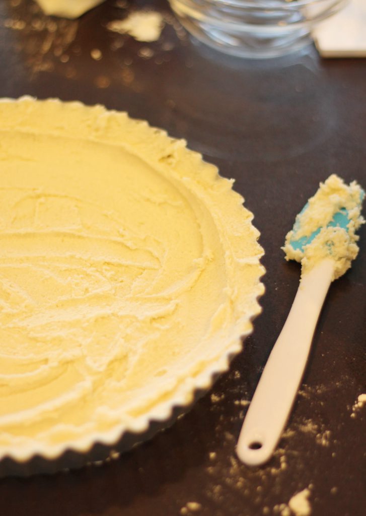 Nicely spread into the ridges of the tart pan. My mother in law got me that cute little scraper. I like to scrape things. 